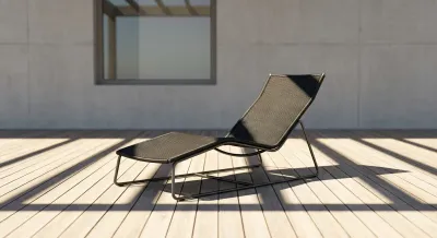 Fauteuil de jardin design sur une terrasse en bois épurée