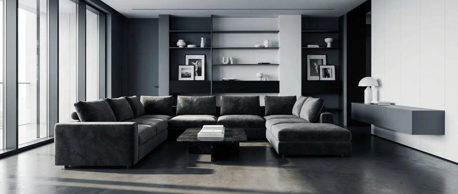 Salon luxueux aménagé en noir blanc et gris avec mobilier design et grandes baies vitrées